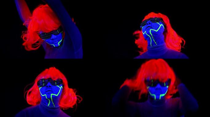 女人用紫外线半机械人的脸漆，假发，发光的服装肖像努力跳舞。亚洲女人。。