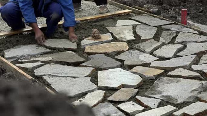 梅森工人用石块制作人行道