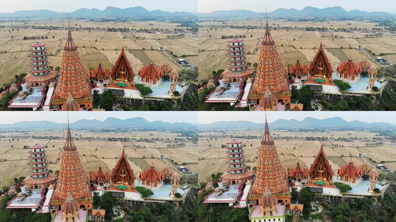 泰国北碧府早晨干旱稻田老虎洞Wat Tham Sua的鸟瞰图