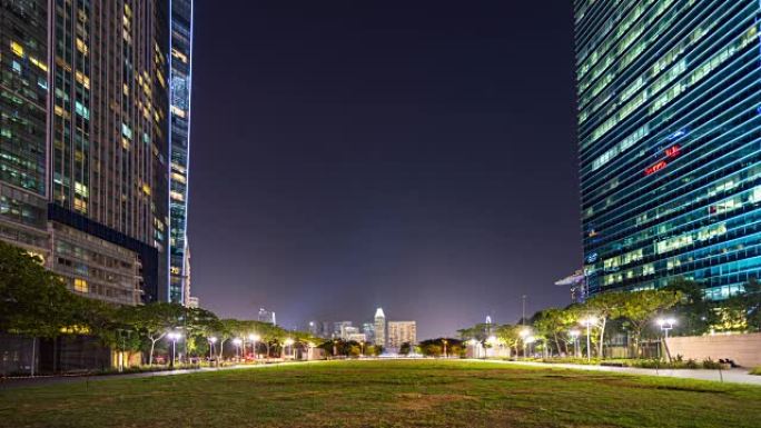 夜间，新加坡摩天大楼中的市中心公园，延时视频