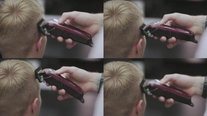 电动剃须刀男性理发。慢动作电动修剪器造型