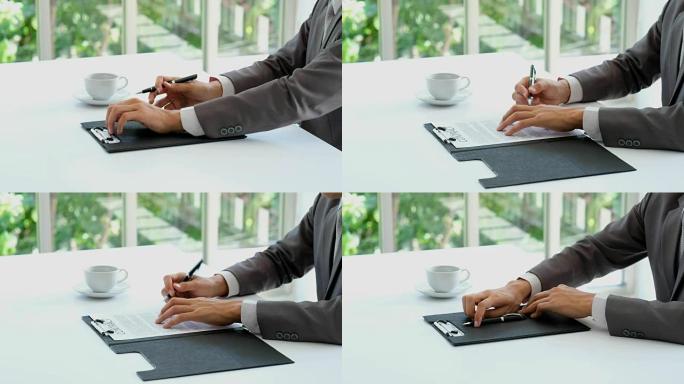 商人在办公室签署协议合同，商业概念