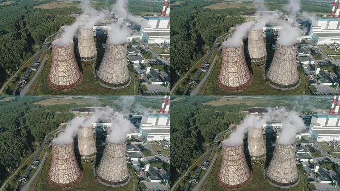 工作电站的鸟瞰图。核电站冷却塔。燃煤发电厂