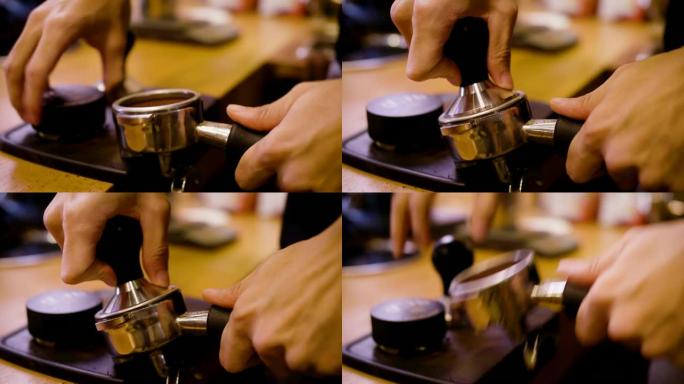 咖啡师在咖啡店用篡改压缩portafilter咖啡渣并制作咖啡浓缩咖啡