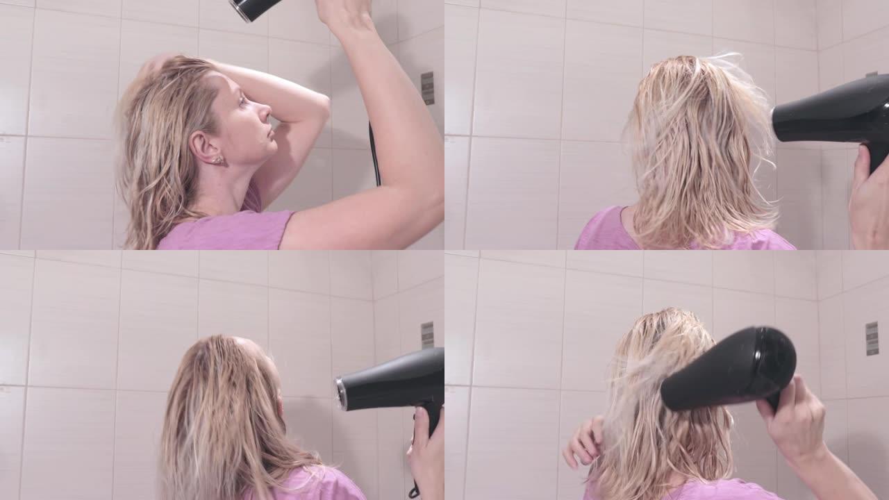 中年金发女人在浴室用吹风机吹干头发