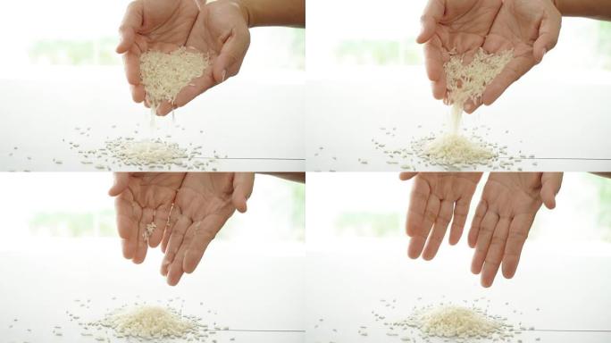 从手掌中倒出白米饭