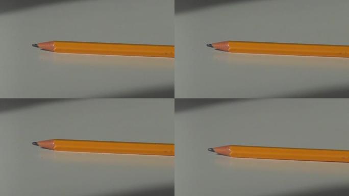 木制铅笔拿放在办公桌上