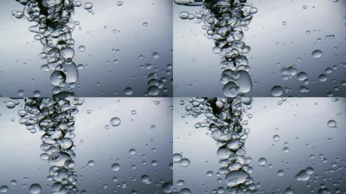 水泡在缓慢运动的明亮背景前的涡流中运动