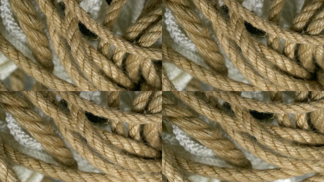 绳索背景设计。棕色、白色旋转套绳螺旋特写