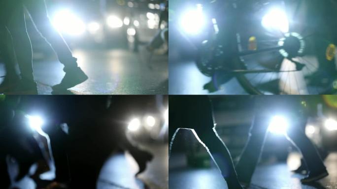 行人的人群在夜间穿越街道，镜头照明弹击中背景中的相机