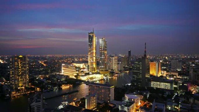 Icon Siam tower庆祝了最新的购物中心，盛大开幕，灯光秀，日落时的城市。