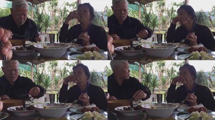 亚洲老年夫妇年老男女吃午餐