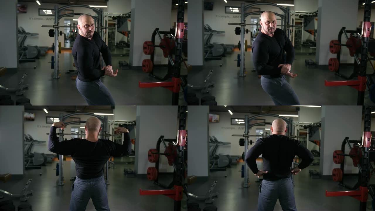 成人健美运动员在4k慢镜头上展示肌肉