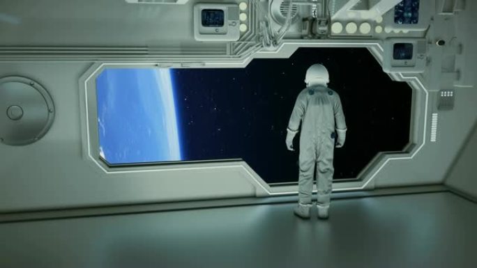 一名宇航员在宇宙飞船上观察地球