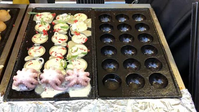 在日本用大鱿鱼烹饪球形食物饺子油炸小吃。这种食物的日语名称 “章鱼烧”。第5部分
