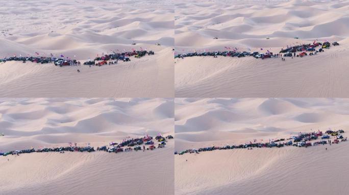 沙漠中的4k空中无人机沙丘童车群