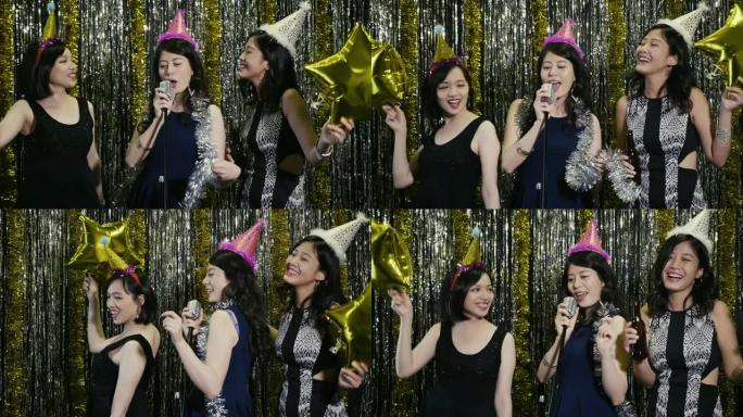 女孩们穿着派对礼服玩着星星气球
