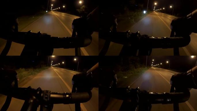 POV骑自行车，晚上带公路赛车的通勤者
