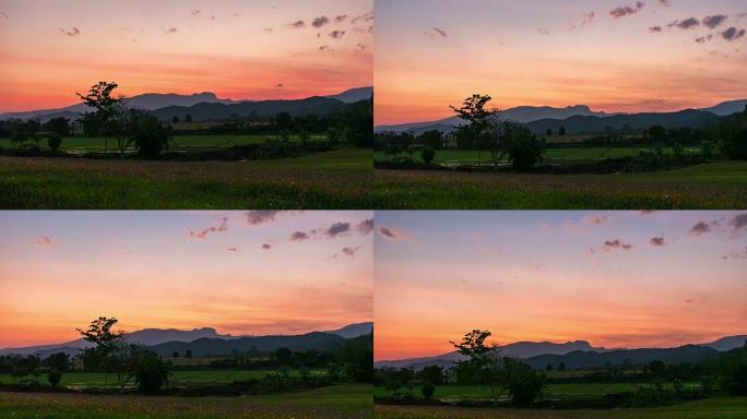泰国稀树草原平原Thung Salaeng Luang国家公园，草原和五彩缤纷的天空，日落时的轮廓山