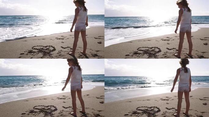 在热带海滩沙滩上玩耍的女孩