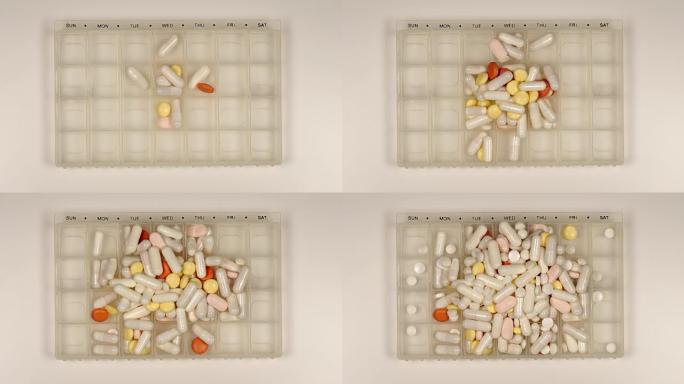 俯视图: 一堆药丸装满药丸分配器-停止运动