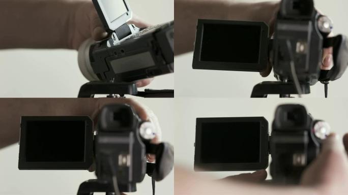 将迷你DV摄像机摄像机安装在三脚架上并打开电源。