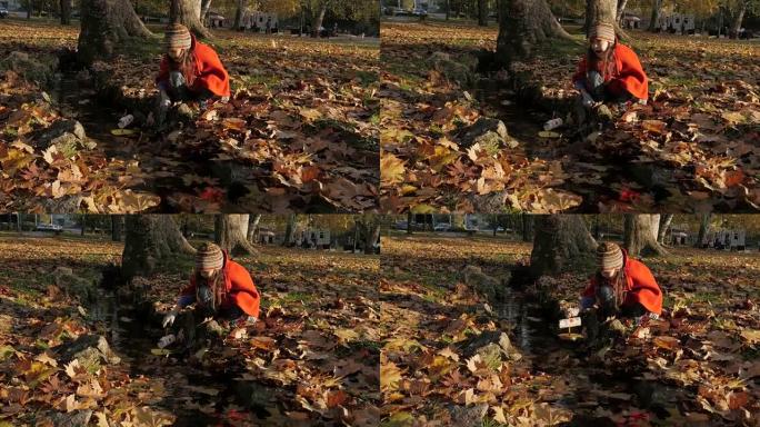 快乐的小女孩在公园玩耍。她年轻时的快乐回忆