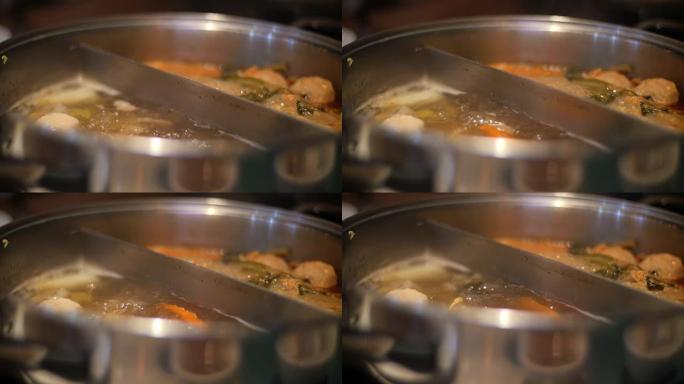 寿喜烧混合蔬菜汤在锅里煮。慢动作