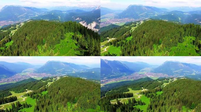 高山山脉。摄像机在德国加米施·帕特基兴附近的高山景观上飞行。中欧令人惊叹的地方。