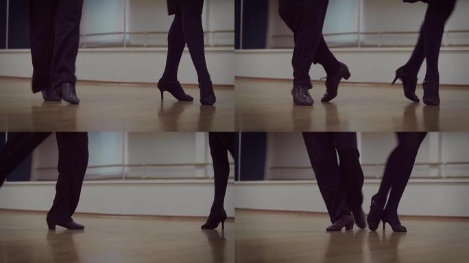 在舞蹈工作室跳舞的男女腿