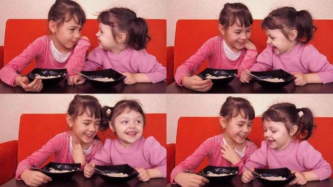 有趣的孩子们吃早餐。