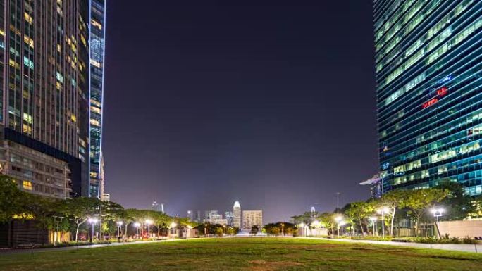 夜间，新加坡摩天大楼中的市中心公园，延时视频