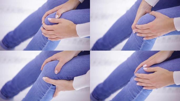 腿部/膝盖/关节的身体伤害-妇女抱着痛苦的身体部分。