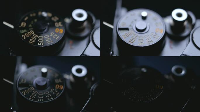老式单反胶片相机和曝光快速拨号的特写细节