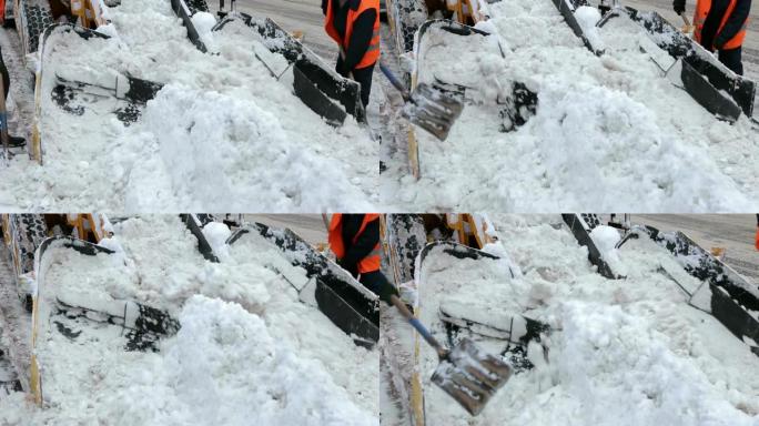 工人和专门的除雪设备清除了街道上的积雪。