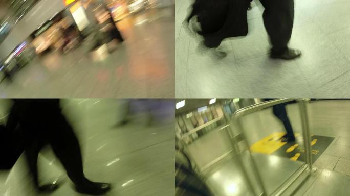在机场航站楼上奔跑的乘客。