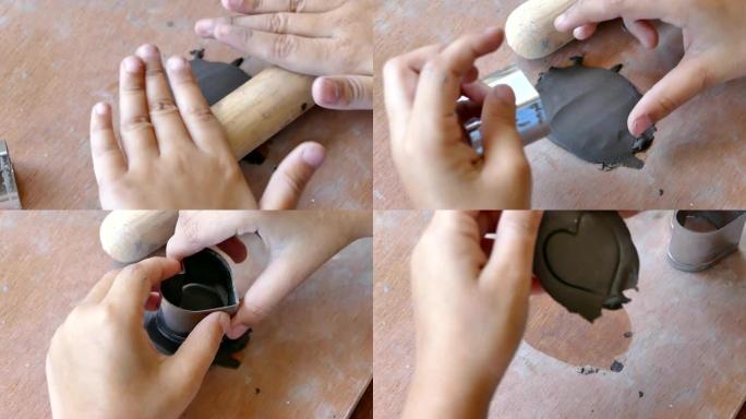 儿童在陶艺工作室玩粘土