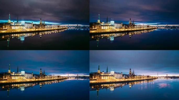 拉脱维亚里加。时间流逝-早晨日出时间城市景观的时间流逝。城堡、圆顶大教堂和圣彼得教堂的夜景。有著名地