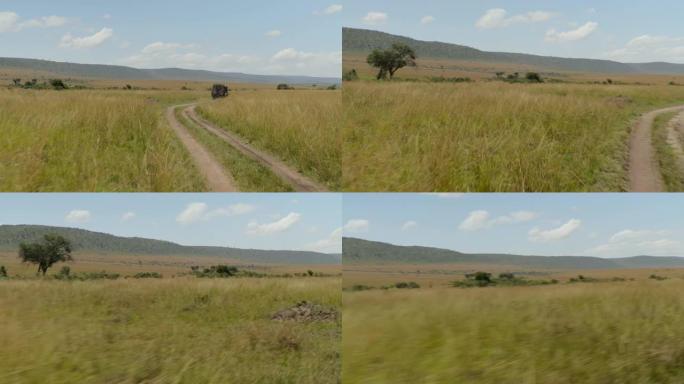 在非洲肯尼亚马赛马拉国家保护区平原上，一辆旅游野生动物园货车的万向节镜头