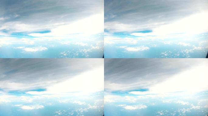 海洋下蓝天白云的POV飞鸟奇幻图案
