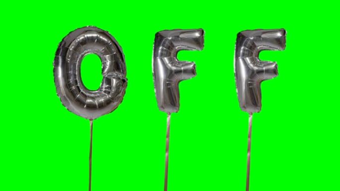 漂浮在绿色屏幕上的氦气银气球字母的文字消失