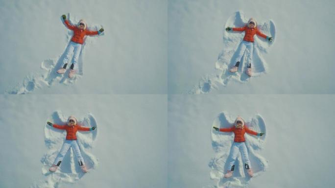 女人在雪地里做天使