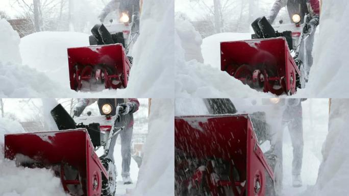 一名老人在暴风雪后使用吹雪机的4k视频