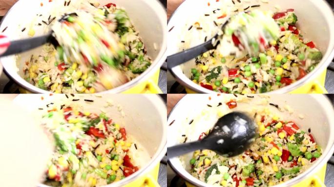 冷冻蔬菜和米饭在锅中烹饪