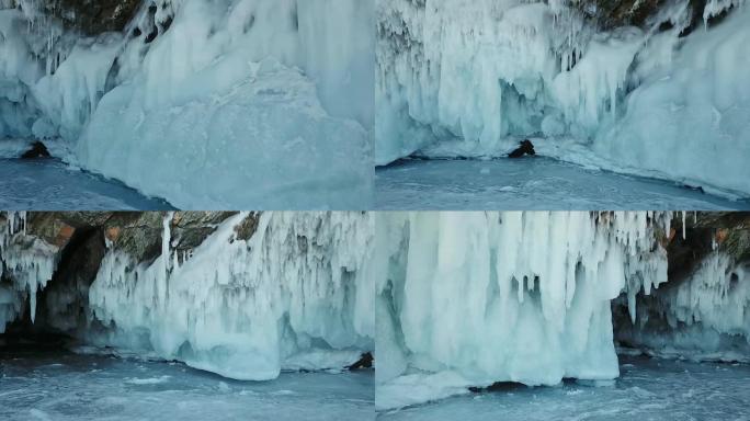 洞内的多莉万向节蓝色冰白尖锐的近距离飞溅绿松石闪亮的柱子长阳亮光。纯真的野生抽象未触及的神秘纹理。冬