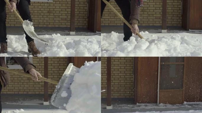 男子清洁铲雪在院子里慢动作