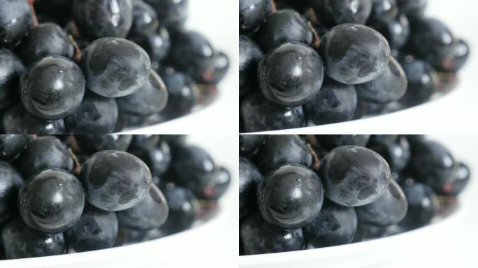 欧洲Vitaceae家族葡萄在盘子上倾斜2160p 30fps超高清镜头-多汁水果葡萄葡萄文化食物背