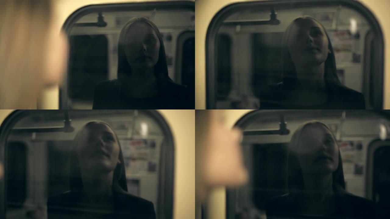 少女坐火车。窗口中的反射