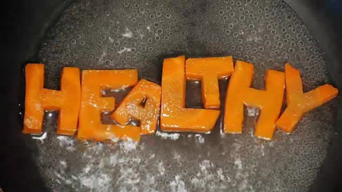 从胡萝卜雕刻的字母中收集的单词健康