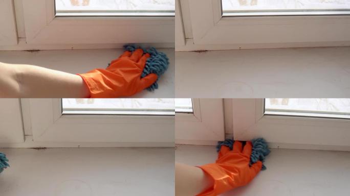 手擦拭窗台以减少过敏原并使房间清新